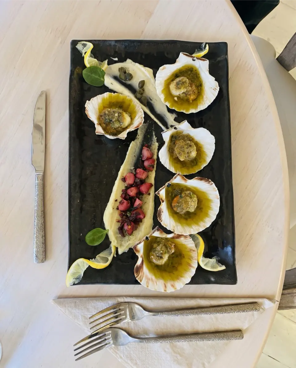 Overhead shellfish plate with lemon at Medusa